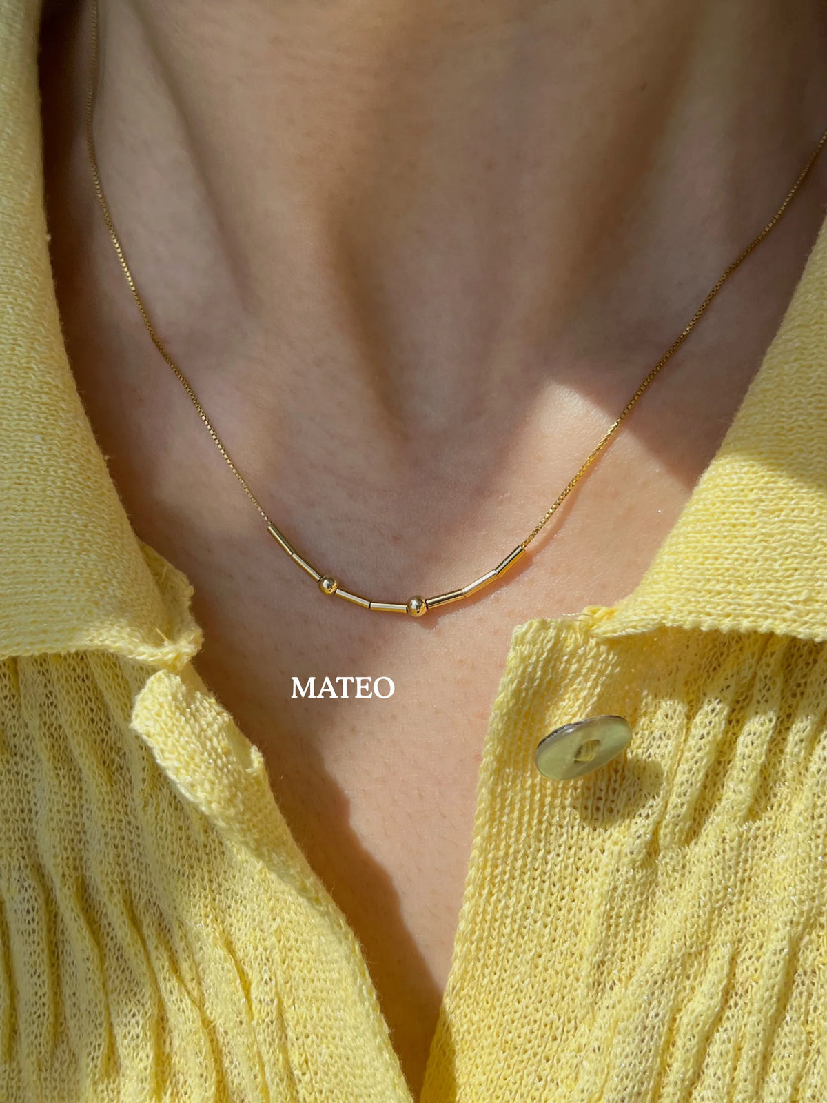 MCJ custom gold Morse code jewelry spelling Mateo, styled as a minimalist everyday name necklace handcrafted in Jaipur