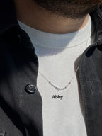 MCJ personalized silver Morse code name necklace spelling Abby, featuring an anti-tarnish rhodium finish on a unisex 18-20 inch chain